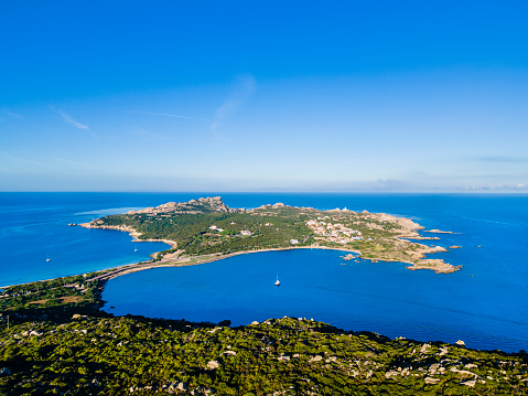 Drone view of Capo Testa, a peninsula stretching in the Strait of Bonifacio in the northern tip of Sardinia