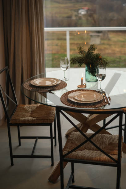 istock dinner served table in a home interior with panoramic windows and mountain views 1463454582