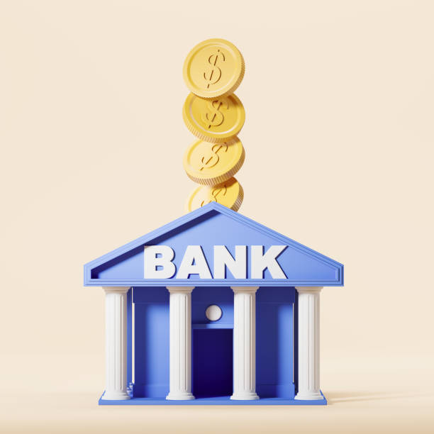 istock Bank and falling gold coins on light background 1463455219