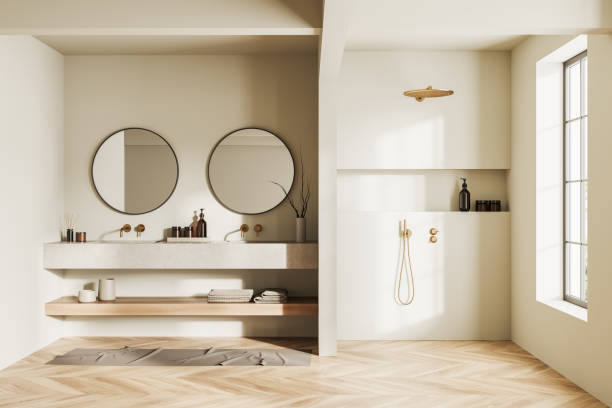 istock Front view on bright bathroom interior with shower, double sink 1463455600