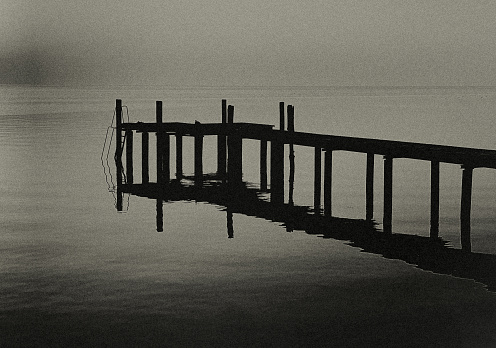 The jetty on Lake Garda at just after sunset.