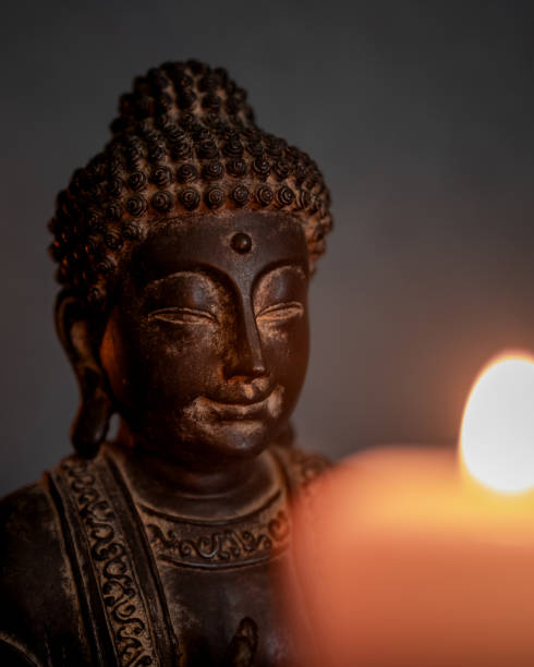 istock The statue of Buddha and candlelight 1463455706