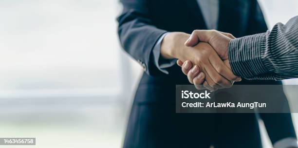 Successful Negotiation And Handshake Concept Two Businessmen Shake Hands With Partners To Celebrate Cooperation And Teamwork Mergers And Acquisitions Successful Negotiations Business Deal Concept Stock Photo - Download Image Now