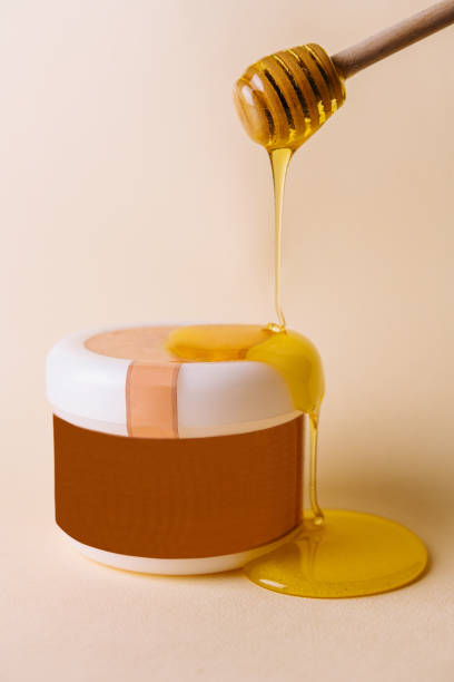 istock Honey drips into natural spa formula for skincare 1463457668