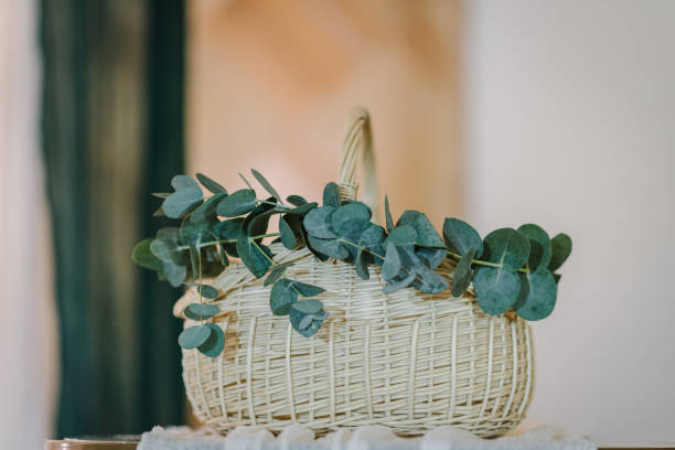 istock Wicker basket with greens for money for a wedding. close up 1463458440