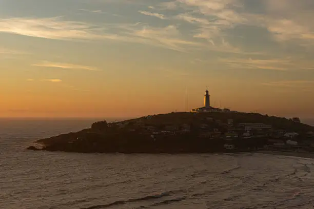 Photo of Sunrise Farol de Santa Marta - Laguna - SC. Scenic landscape of Cape Santa Marta village in Laguna - Santa Catarina  Brazil