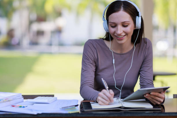 istock Education concepts, High school Young female student or college students studying and reading She using laptop and learning online 1463459805