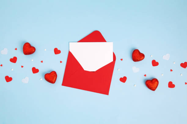 istock Valentine day holiday background with gift, red envelope, paper card and various hearts, romantic message. Copy space. Top view 1463462085