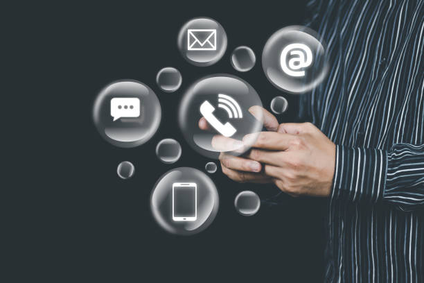 istock Customer support hotline Contact concept Customer service representative's hands are filling out information from mobile phone to computer. and notify the contact address to the service use 1463462217