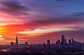 A beautiful sunset sky with vibrant colours over the urban skyline of London