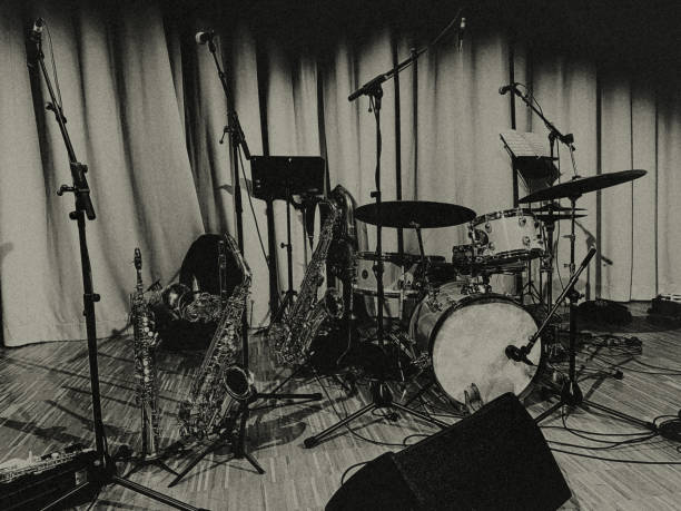 View of a stage with instruments and microphones.