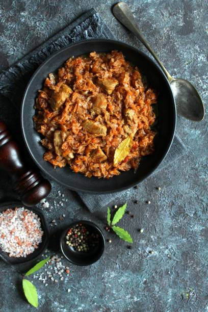 Bigos - cabbage stewed with meat. stock photo