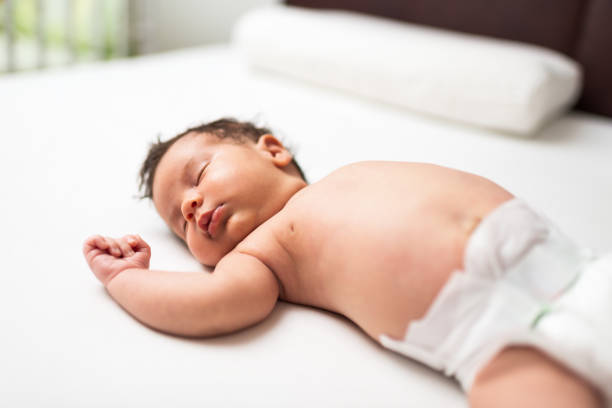 istock Sleeping newborn baby girl 1463466156