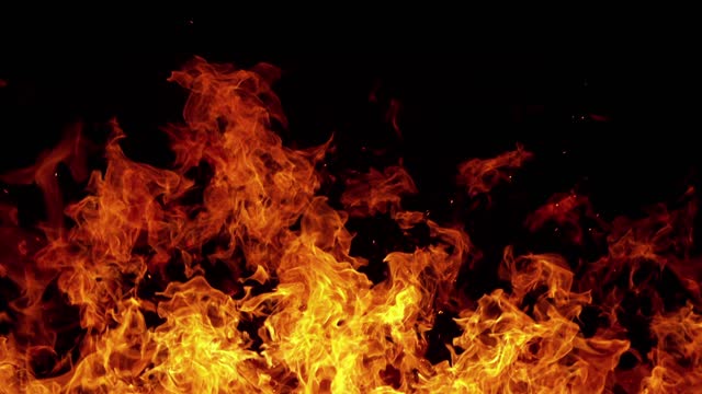 Super slow motion of fire blast isolated on black background.