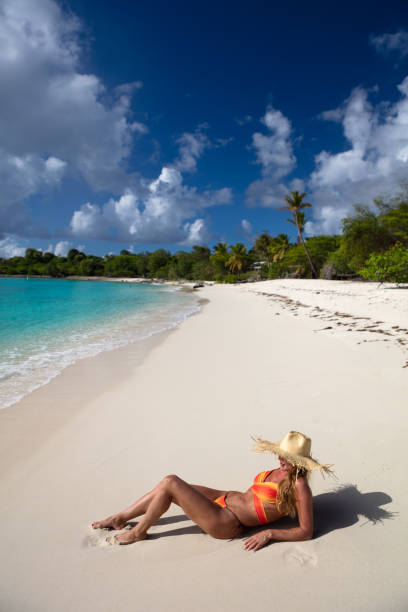 istock Woman  on tropical beach 1463468987