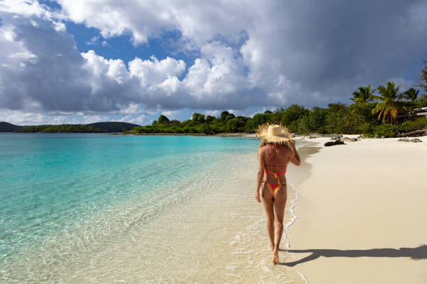 istock Woman  on tropical beach 1463471965