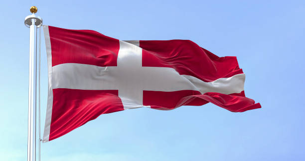 istock Denmark national flag waving in the wind on a clear day. 1463472826