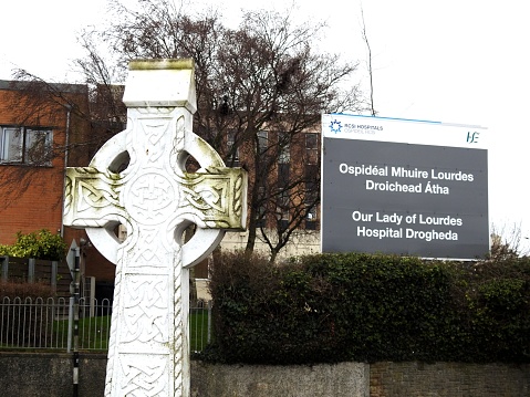 2nd February 2023, Drogheda, County Louth, Ireland. Celtic High Cross gravestone from St. Peter's Cemetery, overlooking Our Lady of Lourdes Hospital in Drogheda.