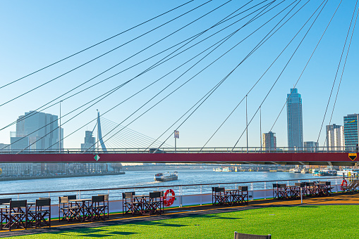 Willemsbrug red cable bridge against blue sky, Rotterdam, Netherlands