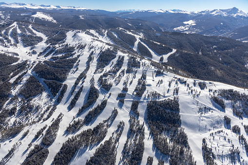 Aerial view of snow covered ski runs near Vail, Colorado, USA