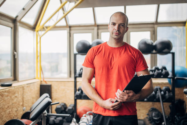 istock Fitness instructor in gym 1463481394