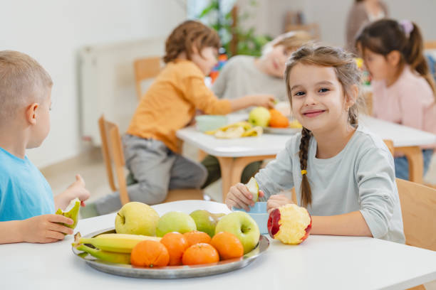 istock Children eating a fruit snack in a kindergarten 1463487992