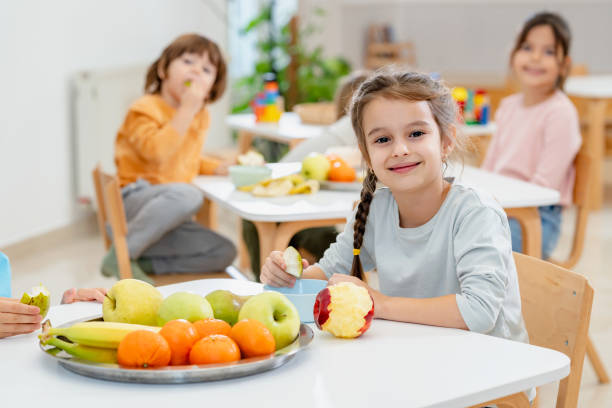 istock Children eating a fruit snack in a kindergarten 1463487993