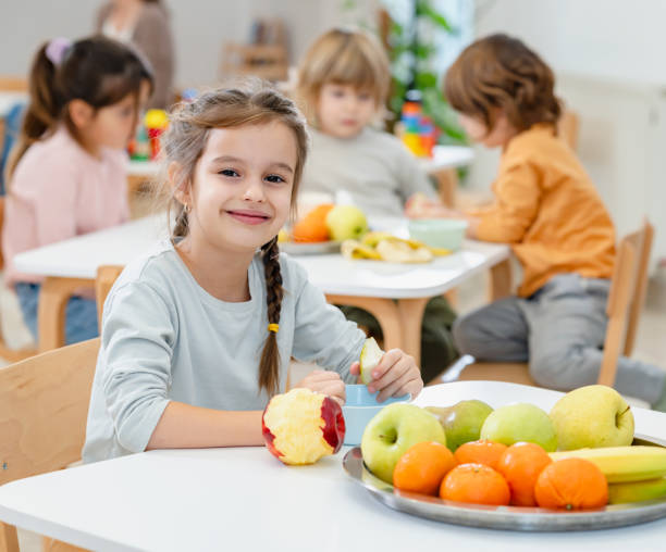 istock Children eating a fruit snack in a kindergarten 1463487994