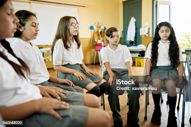 Well Rested Students In Class Elementary Students Doing Relaxation Exercises In Class Stock Photo ...