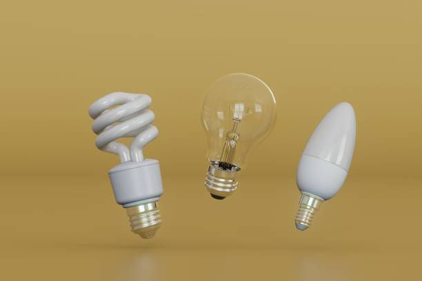istock ordinary and energy-saving light bulbs on a yellow background. 3D render 1463488059