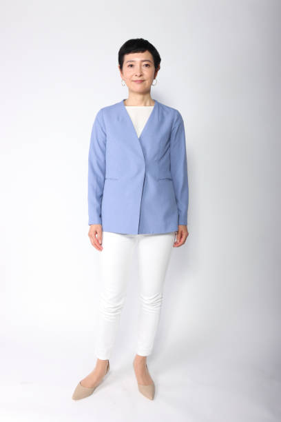 Full Body Portrait Of A Middle-Aged Asian Woman stock photo