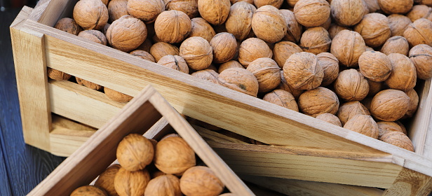 fresh walnuts in a wooden box