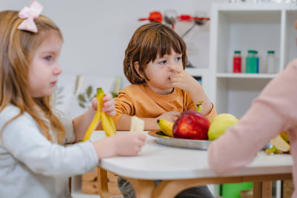 istock Children eating a fruit snack in a kindergarten 1463491955