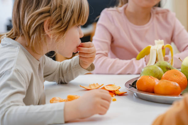 istock Children eating a fruit snack in a kindergarten 1463492114