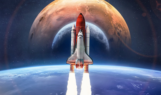 Space shuttle flight in deep space from Earth. Earth, Moon and Mars planet in space. Concept of spaceship mission to other worlds. Rocket launch in space. Elements of this image furnished by NASA (url:https://images-assets.nasa.gov/image/PIA00405/PIA00405~small.jpg https://www.nasa.gov/sites/default/files/styles/full_width_feature/public/thumbnails/image/iss060e007297.jpg https://mars.nasa.gov/system/site_config_values/meta_share_images/1_mars-nasa-gov.jpg  https://www.nasa.gov/sites/default/files/styles/full_width_feature/public/images/164234main_image_feature_713_ys_full.jpg)