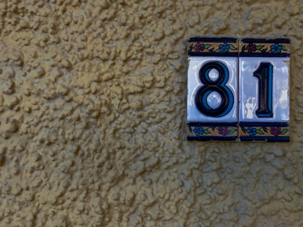 ceramic plaques placed on the wall with the number eighty-one