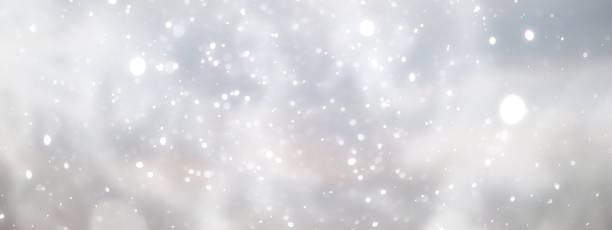 istock blue snowfall bokeh background, abstract snowflake background on blurred abstract blue 1463494179