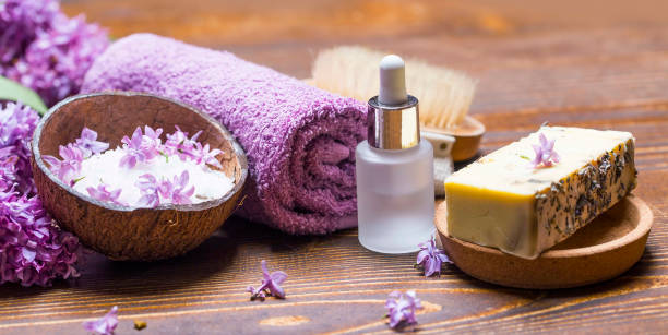 istock Lila spa setting with natural soap and pure essential oil 1463497963