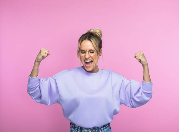 istock Successful woman with clenched fists 1463498597