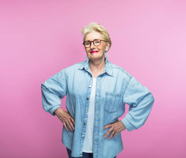 istock Elderly woman standing with arms akimbo 1463499469