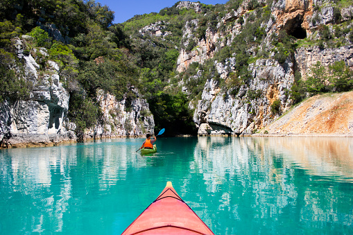 Two kayaks rowing towards the Verdon Gorge, in the Provence region of France