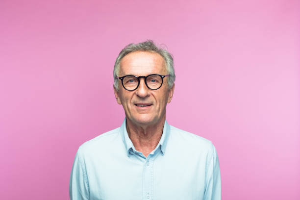 istock Smiling retired senior man wearing eyeglasses 1463500312