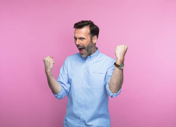 istock Man screaming with clenched fists 1463500805