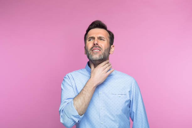 istock Man suffering with neck pain 1463500831