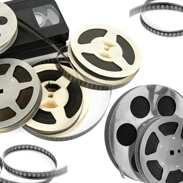 istock Film reel and video cassette isolated on white . Collage. 1463501840