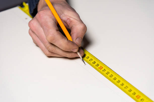 istock A carpenter works in a furniture workshop 1463507141