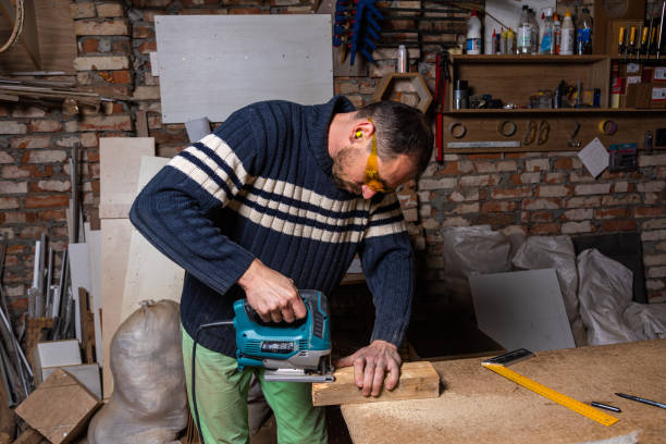 istock A carpenter works in a furniture workshop 1463507965