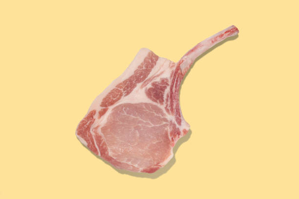 istock Meat Chops with bone pork lamb shank fillet on colorful background 1463522564