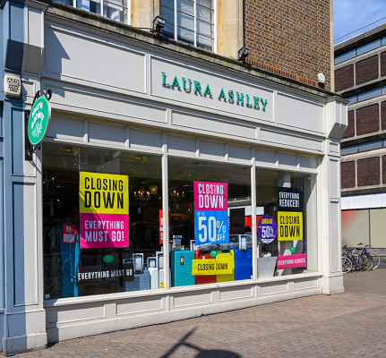 Bromley (Greater London), Kent, UK. Laura Ashley store in Bromley High Street showing the Laura Ashley logo. The shop is having a closing down sale.