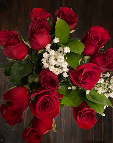 Overhead view of one dozen red roses